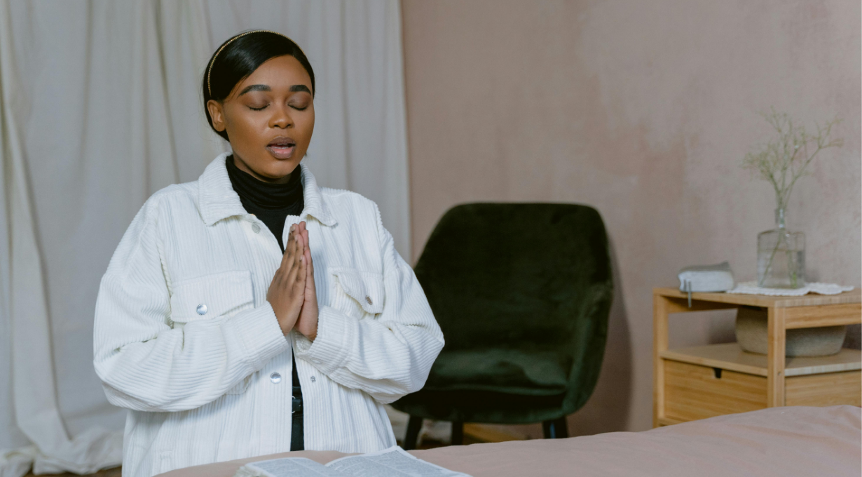 A student making a prayer for exams before studying