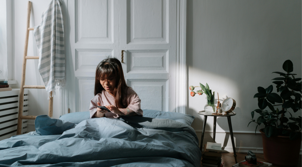 woman sending good morning wishes to a friend over text