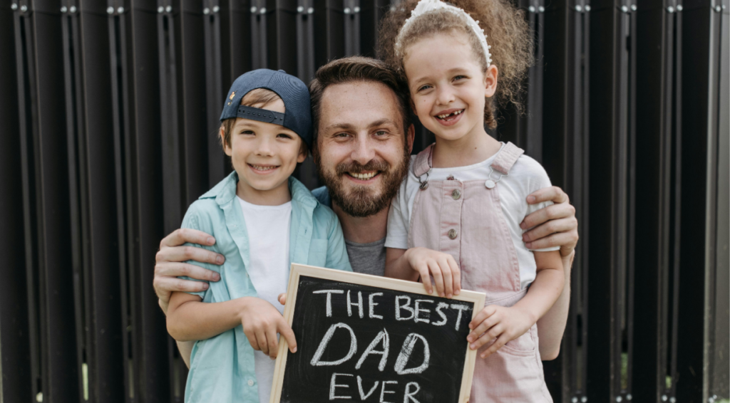 Children celebrating fathers day wishes with their dad.