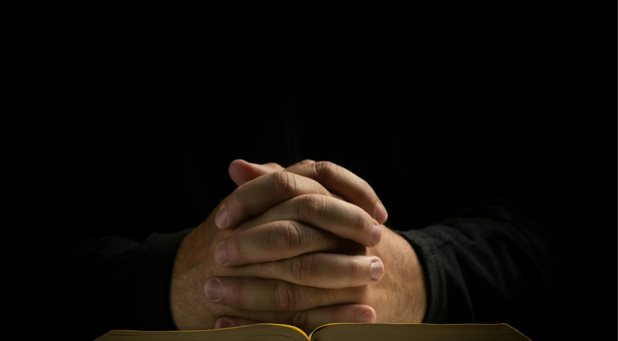 Prayer for guidance with folded hands