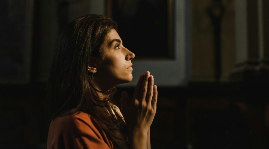 A girl seeking prayer for guidance at a major life decision