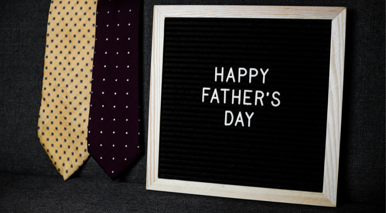 A board with Father's Day wishes written on it