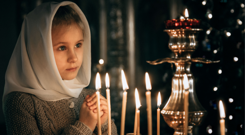 A child doing a prayer for protection